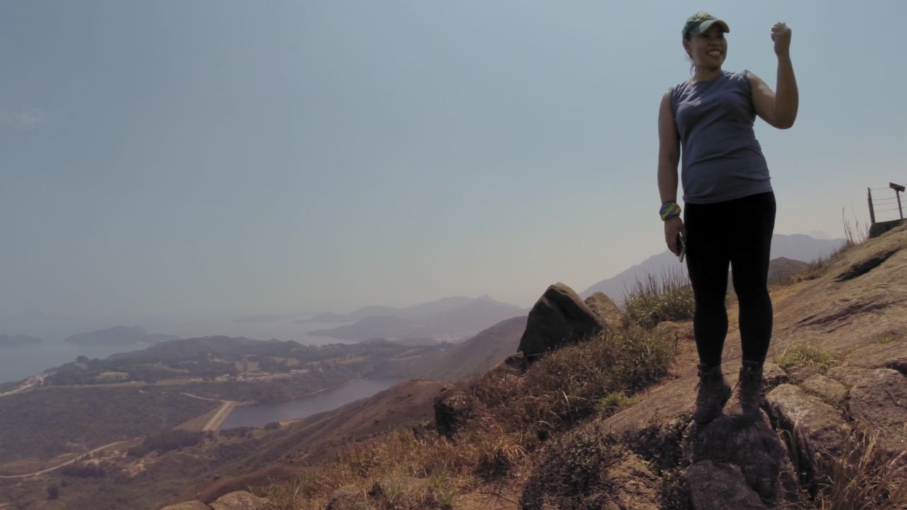 Liza, 46, hikes and practices taekwondo in her spare time.