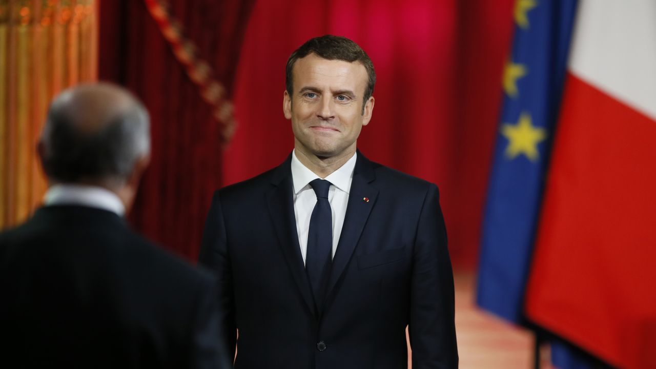 Emmanuel Macron is sworn in as French President at the Elysee Palace in Paris on Sunday. 