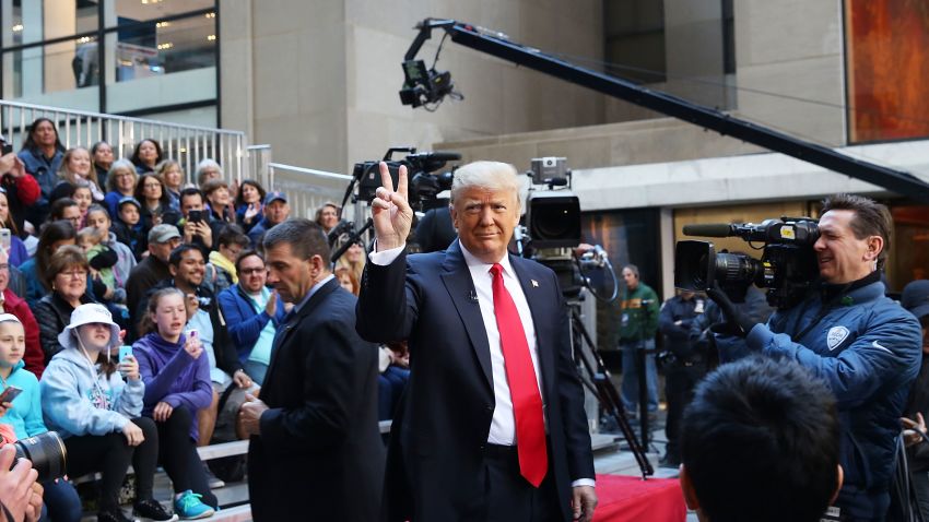 NEW YORK, NY - APRIL 21:  Republican presidential candidate Donald Trump waves while appearing at an NBC Town Hall at the Today Show on April 21, 2016 in New York City.  The GOP front runner appeared with his wife and family and took questions from audience members.  (Photo by Spencer Platt/Getty Images)