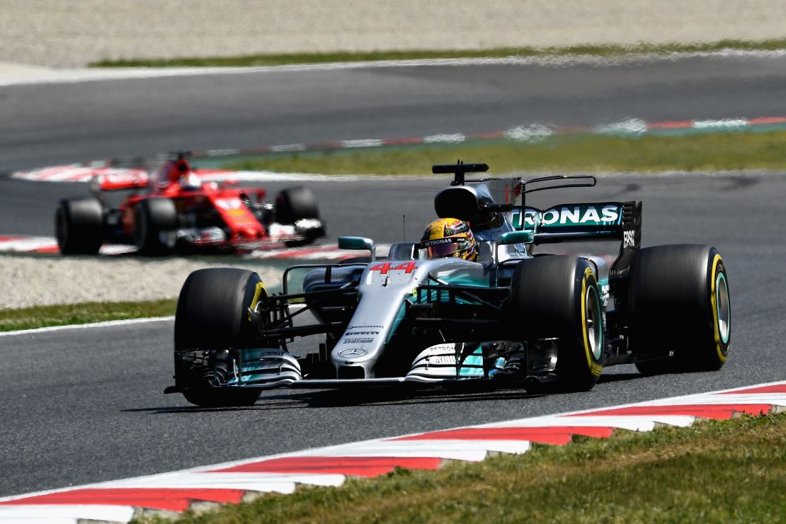 Lewis Hamilton leads from Sebastian Vettel on his way to victory in the Spanish Grand Prix in Barcelona. 