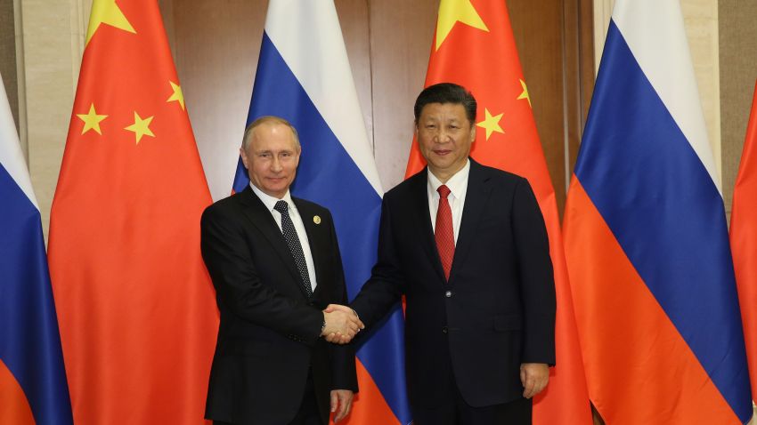 BEIJING, CHINA - MAY 13: Russian President Vladimir Putin (L) shakes hands with Chinese President Xi Jinping ahead a bilateral meeting at Diaoyutai State Guesthouse in Beijing, China, 14 May 2017. The Belt and Road Forum focuses on the One Belt, One Road (OBOR) trade initiative. (Photo by Wu Hong-Pool/Getty Images)