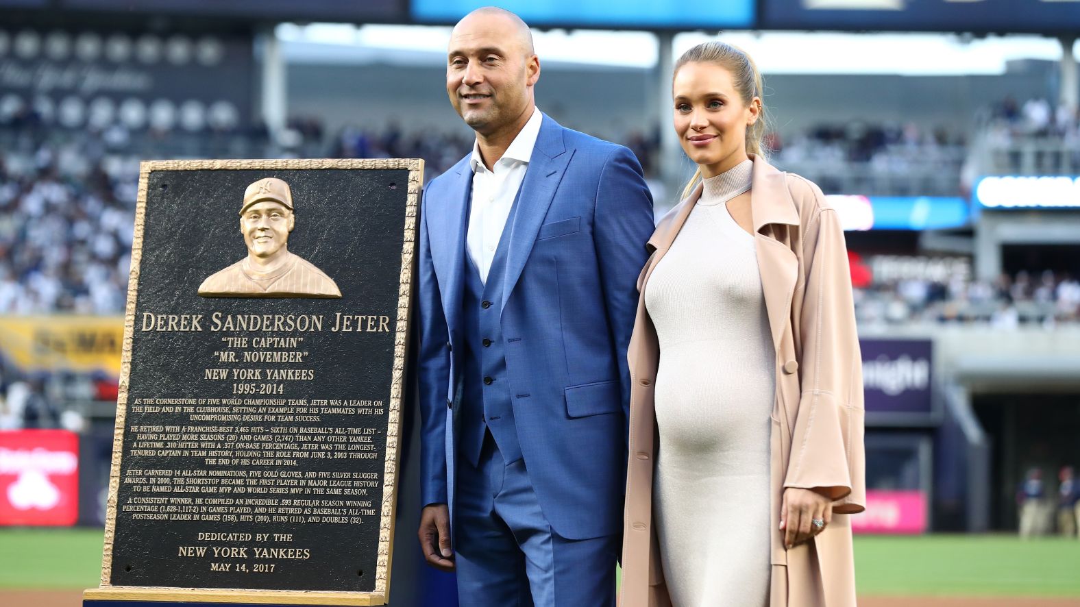 Jeter and his wife, Hannah, pose for photos during his retirement ceremony in May 2017.