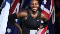 Serena Williams of the US smiles during the awards ceremony after her victory against Venus Williams of the US in the women's singles final on day 13 of the Australian Open tennis tournament in Melbourne on January 28, 2017. / AFP / WILLIAM WEST / IMAGE RESTRICTED TO EDITORIAL USE - STRICTLY NO COMMERCIAL USE        (Photo credit should read WILLIAM WEST/AFP/Getty Images)
