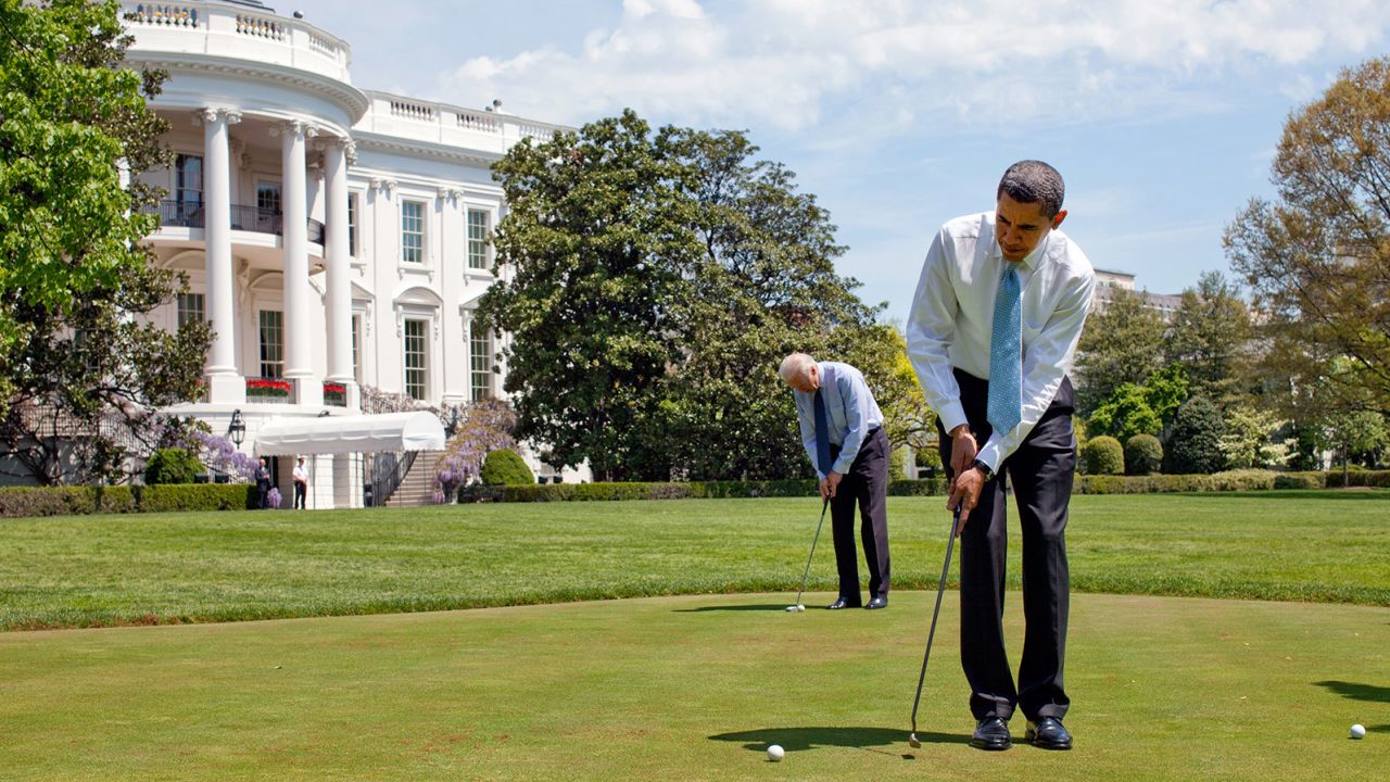 President Barack Obama and Vice President Joe Biden putt on the White House putting green April 24, 2009. 
