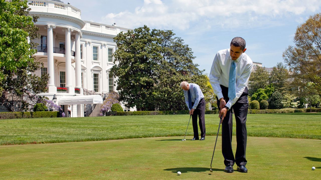 President Barack Obama and Vice President Joe Biden putt on the White House putting green April 24, 2009.