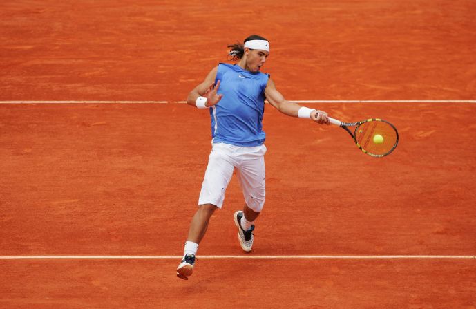 By the following year, Nadal had cemented his place among tennis' elite and was developing a fearsome reputation on clay. This time wearing a slightly less garish light blue, Nadal picked up his second consecutive French Open title by becoming the first man to beat Roger Federer in a grand slam final.