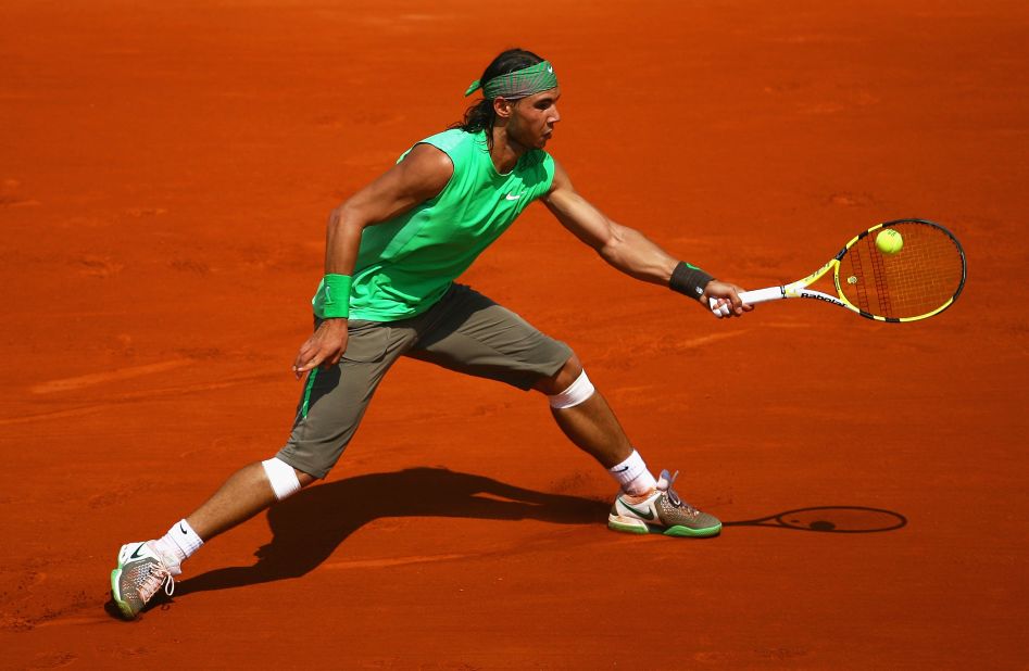 A year later, Nadal opted for a variation on his debut French Option look, this time sporting an all-green combo. Nadal reached world No. 1 for the first time in his career in 2008, helped by his fourth consecutive Roland Garros title -- matching Bjorn Borg's record of consecutive trophies, while also becoming only the seventh man to win a grand slam without dropping a set.
