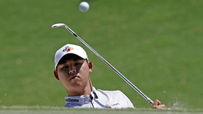 Si Woo Kim hits the ball onto the green during the final round of The Players Championship on Sunday, May 14. The 21-year-old South Korean <a href="index.php?page=&url=http%3A%2F%2Fwww.cnn.com%2F2017%2F05%2F15%2Fgolf%2Fkim-si-woo-tpc-sawgrass-military-service%2Findex.html" target="_blank">won the tournament</a> by three strokes. It was his second win on the PGA Tour.