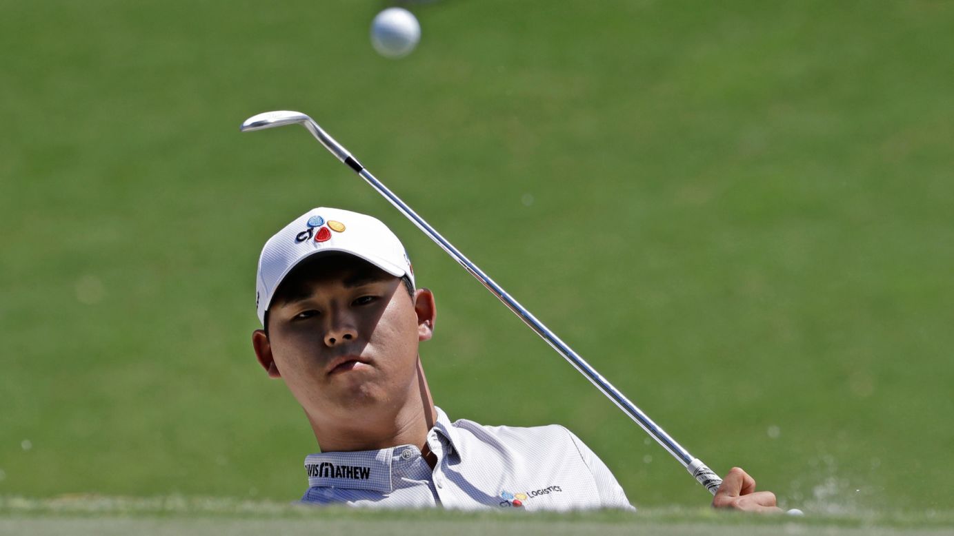 Si Woo Kim hits the ball onto the green during the final round of The Players Championship on Sunday, May 14. The 21-year-old South Korean <a href="http://www.cnn.com/2017/05/15/golf/kim-si-woo-tpc-sawgrass-military-service/index.html" target="_blank">won the tournament</a> by three strokes. It was his second win on the PGA Tour.