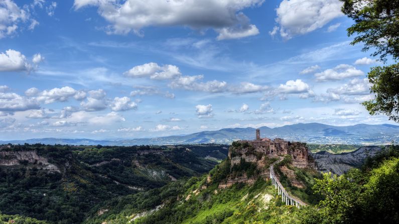 <strong>33 BEAUTIFUL PLACES IN ITALY: Civita di Bagnoregio, Viterbo: </strong>Civita was founded by the Etruscans more than 2,500 years ago and sits atop a rocky plateau overlooking the Tiber river valley in central Italy. The town is in constant danger of destruction by erosion and was placed on the World Monuments Watch list in 2006.
