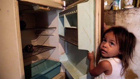 For three-year-old Jennifer, a fridge with nothing but two old pineapples is normal.