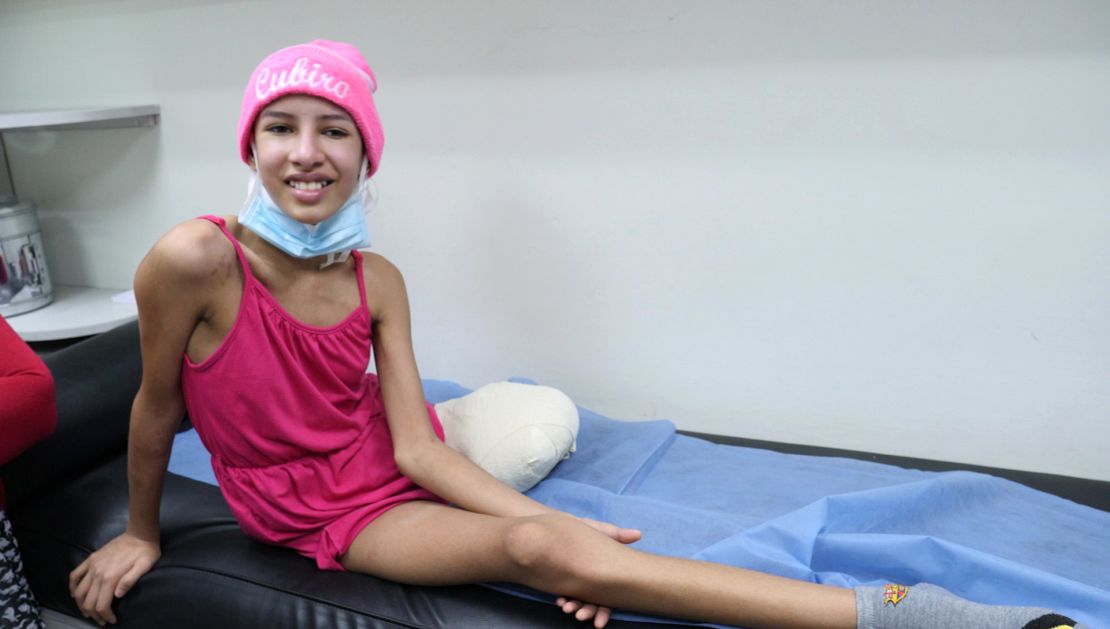 Daniela feels pain in her missing leg, amputated because there was no early detection of her cancer or medicine to treat it. 