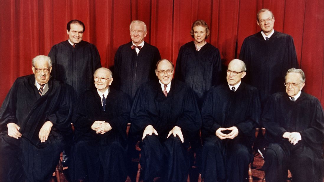 Kennedy, top right, appears in a formal Supreme Court portrait in April 1988. In the front row, from left, are Thurgood Marshall, William Brennan Jr., Chief Justice William Rehnquist, Byron White and and Harry Blackmun. In the back row, from left, are Antonin Scalia, John Paul Stevens, Sandra Day O'Connor and Kennedy. 