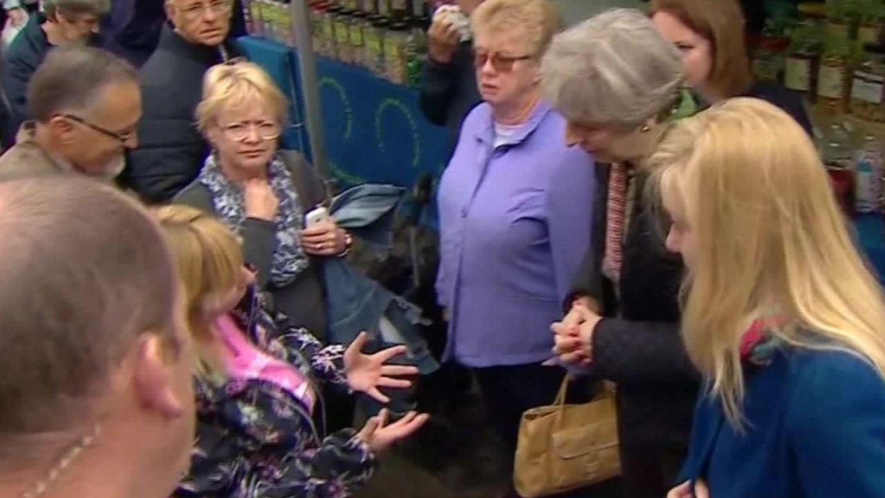 theresa may confronted disability benefits bts_00000000.jpg