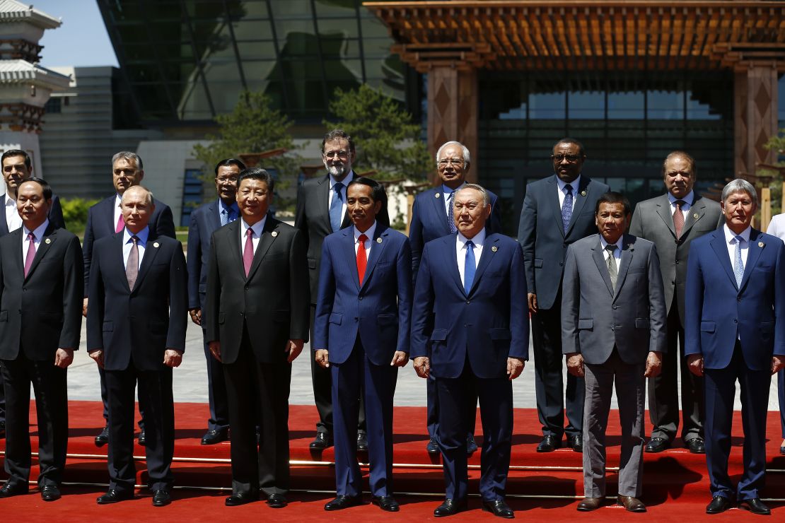 Russian President Vladimir Putin, Chinese President Xi Jinping and other world leaders pose for a group photo at the Belt and Road Forum in Beijing. 