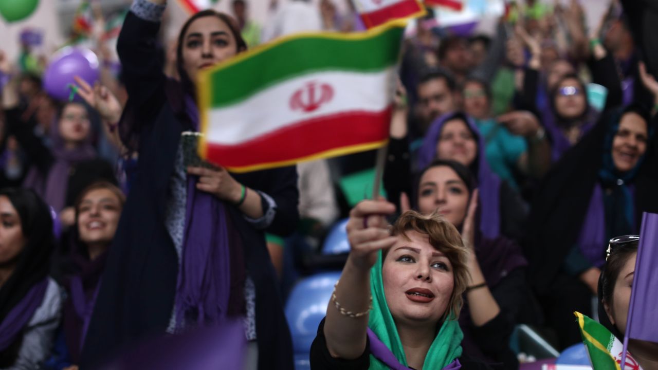 Supporters of Iranian President and presidential candidate Hassan Rouhani chant slogans during an electoral campaign gathering in the northwestern city of Zanjan on May 16, 2017.
Iran's presidential election on May 19 is effectively a choice between moderate incumbent Hassan Rouhani and hardline jurist Ebrahim Raisi, with major implications for everything from civil rights to relations with Washington. / AFP PHOTO / Behrouz MEHRI        (Photo credit should read BEHROUZ MEHRI/AFP/Getty Images)