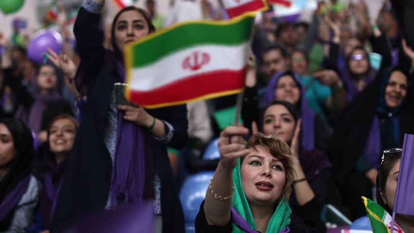 Supporters of Iranian President and presidential candidate Hassan Rouhani chant slogans during an electoral campaign gathering in the northwestern city of Zanjan on May 16, 2017.
Iran's presidential election on May 19 is effectively a choice between moderate incumbent Hassan Rouhani and hardline jurist Ebrahim Raisi, with major implications for everything from civil rights to relations with Washington. / AFP PHOTO / Behrouz MEHRI        (Photo credit should read BEHROUZ MEHRI/AFP/Getty Images)