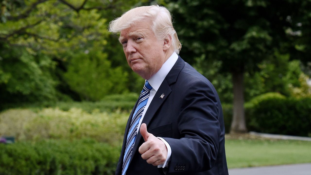 US President Donald Trump exits Marine One on the South Lawn of the White House in Washington, DC, on May 13, 2017 . / AFP PHOTO / Olivier Douliery        (Photo credit should read OLIVIER DOULIERY/AFP/Getty Images)