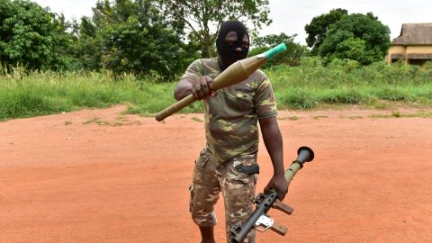 A mutinous soldier holds a RPG rocket launcher inside a military camp in the Ivory Coast's central second city Bouake.
