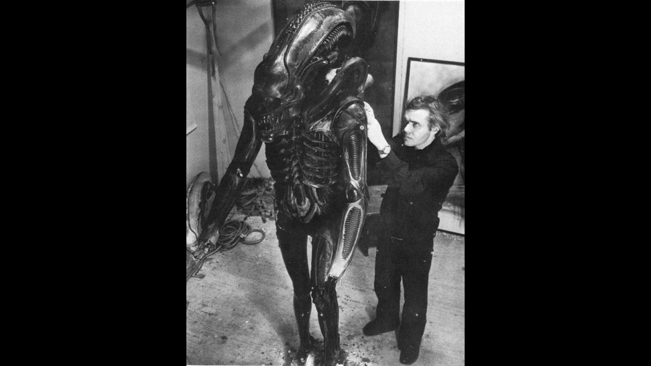 H.R. Giger with the alien costume from "Alien." (1979) 