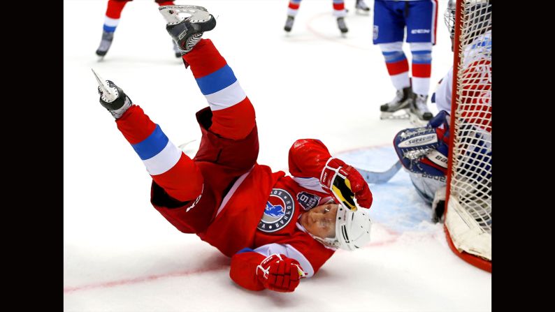 Russian President Vladimir Putin takes a tumble during a hockey gala in Sochi, Russia, on Wednesday, May 10. Putin scored six goals in <a href="index.php?page=&url=http%3A%2F%2Fwww.cnn.com%2F2017%2F05%2F11%2Fsport%2Fvladimir-putin-ice-hockey%2F" target="_blank">the exhibition game.</a>