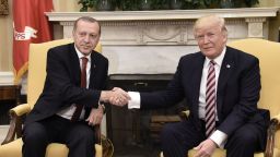 US President Donald Trump shakes hands with Turkish President Recep Tayyip Erdogan during a meeting in the Oval Office of the White House in Washington, DC, on May 16, 2017. / AFP PHOTO / Olivier Douliery        (Photo credit should read OLIVIER DOULIERY/AFP/Getty Images)