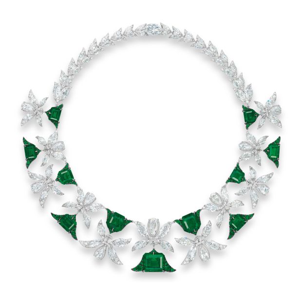 Edmond Chin's Palmette necklace features 11 "no oil" Colombian emeralds (ranging from 3.03-12.34 carats), among the world's rarest stones, set in a Middle Eastern motif with vari-cut diamond foliate links. 