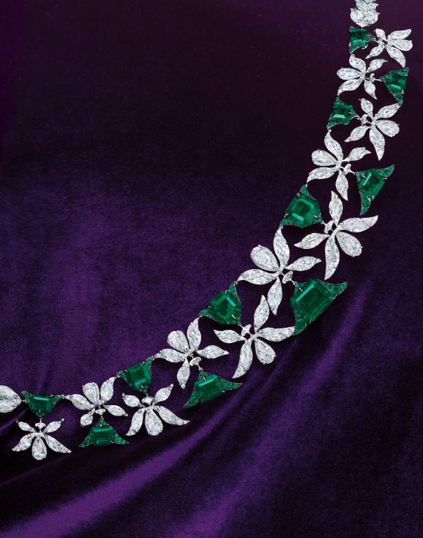"When you wear it, you see beautiful green flowers coming from the palms, up and down the neck," Chin says.