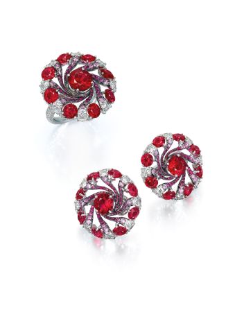 Comprising a ring and earrings, the design by Edmond Chin swirls pink sapphires and diamonds around 27 Mozambique rubies, which are famed for their purity and pop of color.