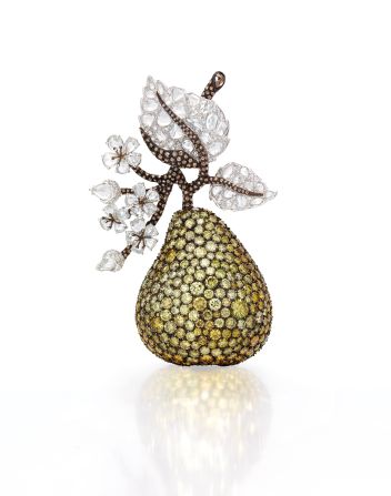 The pear by Michelle Ong features yellow and brown diamonds, topped with the rose-cut diamond foliage and brown diamond stems. These were collected over some 25 years.