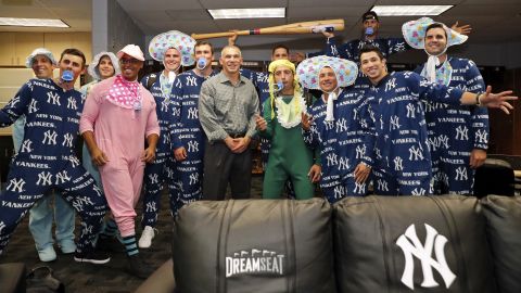 A variation on a theme: The New York Yankees, who are very manly, showing off the recent onesie trend.