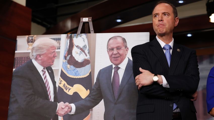 Rep. Adam Schiff, D-Calif., ranking member of the House Intelligence Committee stands next to a photograph of President Donald Trump and Russian Foreign Minister Sergey Lavrov, during a news conference on Capitol Hill in Washington, Wednesday, May 17, 2017. (AP Photo/Alex Brandon)