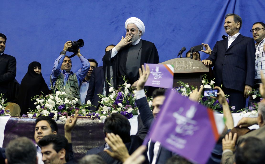 Rouhani blows a kiss to supporters at a rally in Tehran last week.