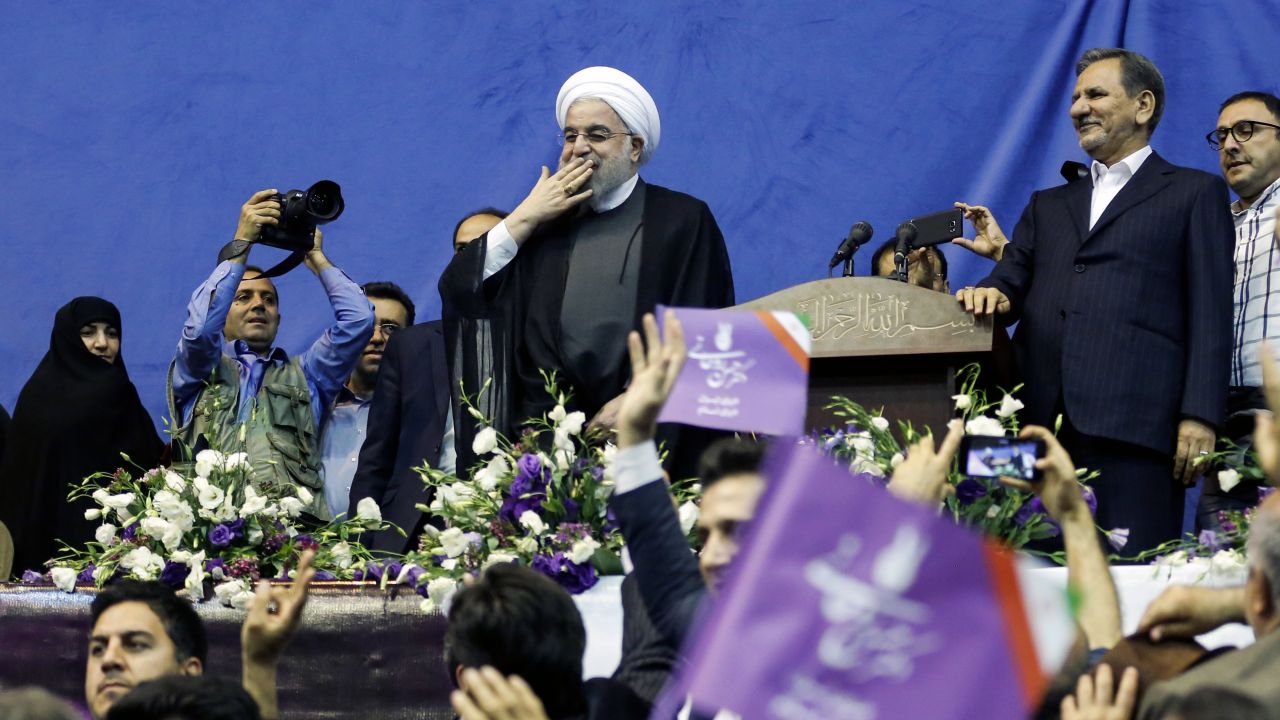 Rouhani blows a kiss to supporters at a rally in Tehran last week.