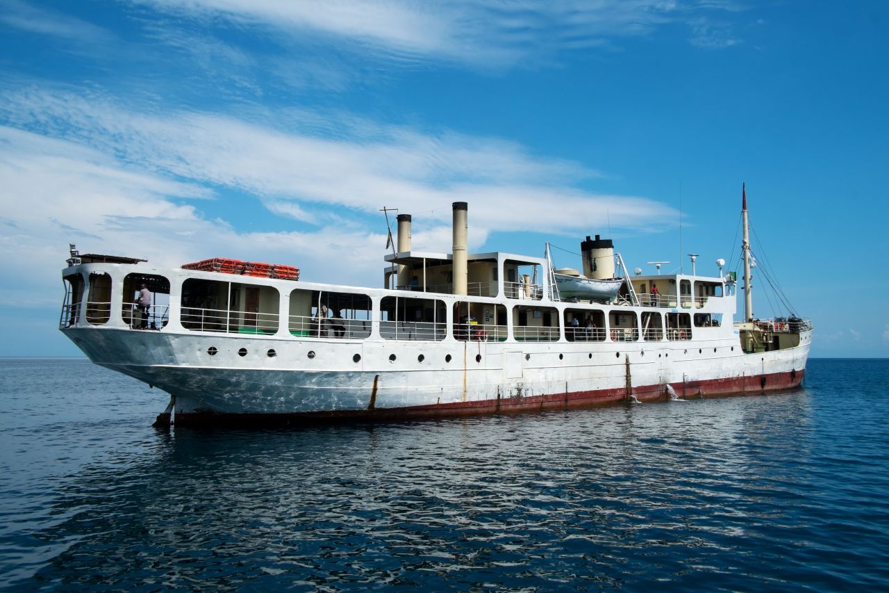 A passenger cargo vessel on the lake. Starting in the early 2000s, scientists have documented rapid water surface temperature rises, most likely because of global climate change, related to an increase in greenhouse gas emissions.