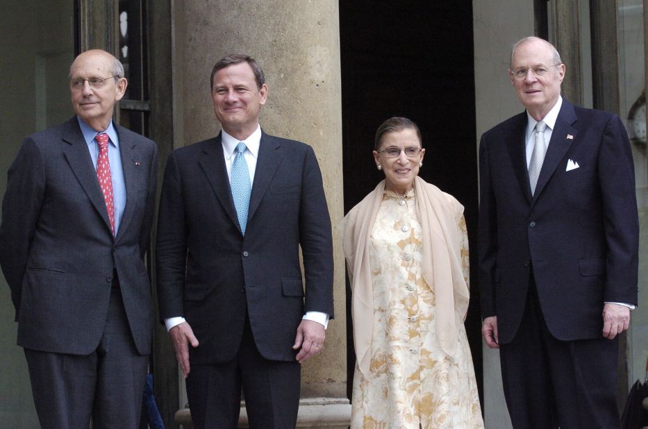From left, Supreme Court Justices Stephen Breyer, John Roberts, Ginsburg and Anthony Kennedy pose for a photo before meeting with French President Nicolas Sarkozy in Paris in July 2007.