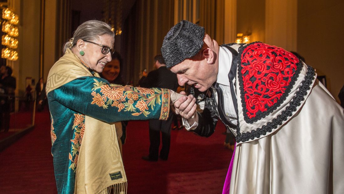 Ginsburg, with an extra from "Carmen," attends the opera at the Kennedy Center in Washington in October 2015.