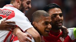 Monaco's French forward Kylian Mbappe (C) celebrates after scoring a goal during the French L1 football match Monaco (ASM) vs St Etienne (ASSE) on May 17, 2017, at the Louis II Stadium in Monaco. / AFP PHOTO / BORIS HORVAT        (Photo credit should read BORIS HORVAT/AFP/Getty Images)