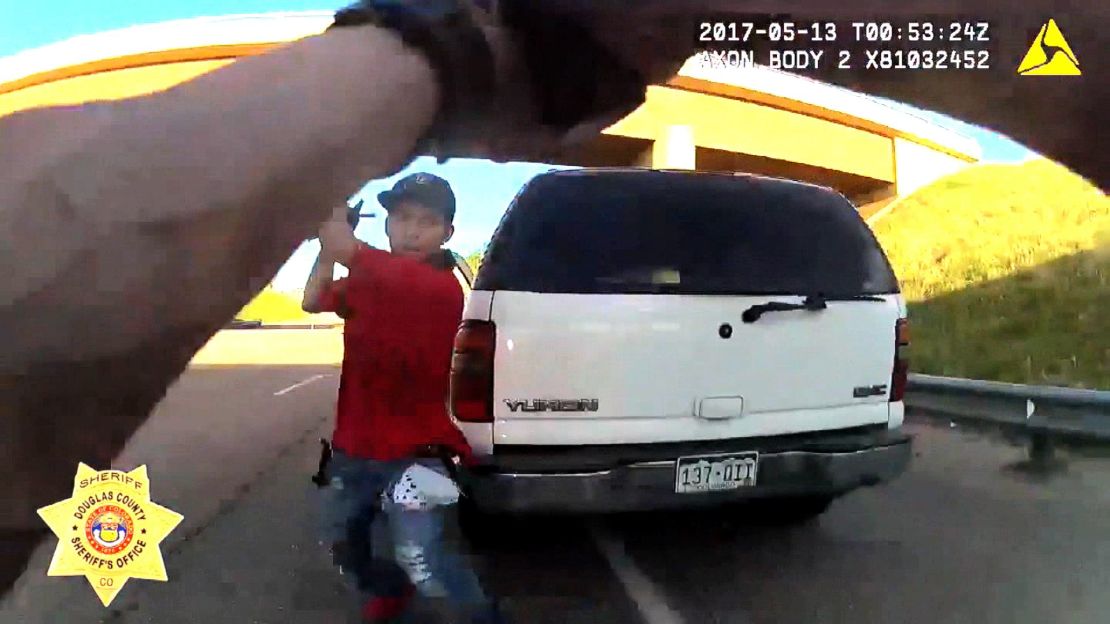 Deputy tries to help driver, gets rushed with assault rifle instead | CNN