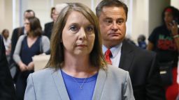 Betty Shelby leaves the courtroom with her husband, Dave Shelby, right, after the jury in her case began deliberations in Tulsa, Okla., Wednesday, May 17, 2017. Shelby, who fatally shot an unarmed black man last year, was found not guilty later Wednesday of first-degree manslaughter. (AP Photo/Sue Ogrocki)