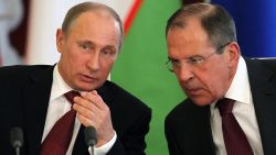 MOSCOW, RUSSIA - APRIL 15:  Russian President Vladimir Putin (L) talks to talks to Foreign Minister Sergey Lavrov during a meeting with Uzbekistan President Islam Karimov in the Kremlin on April 15, 2013 in in Moscow, Russia. Karimov is on a state visit to Russia. (Photo by Sasha Mordovets/Getty Images)