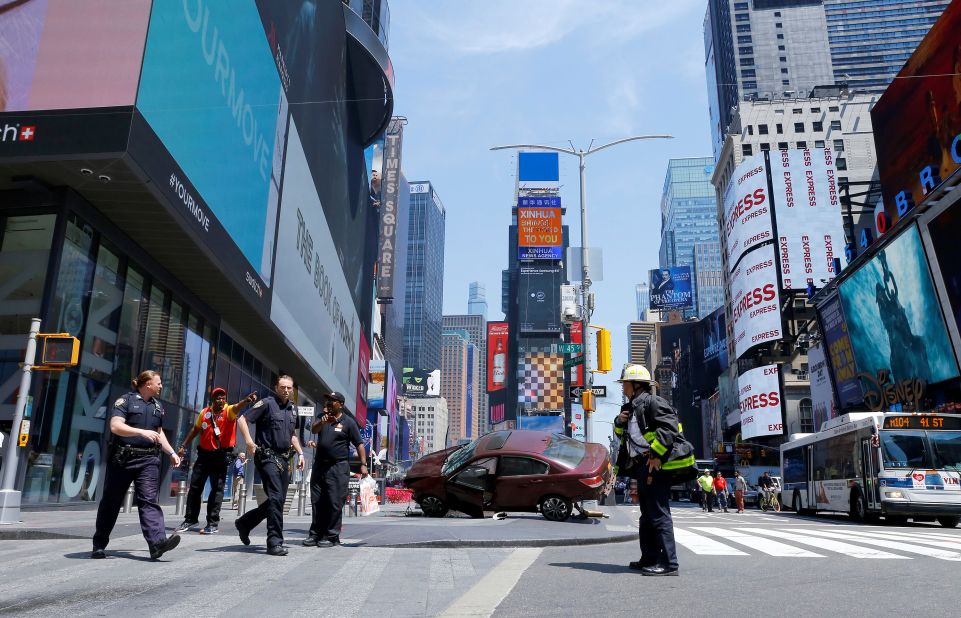 Before striking pedestrians, the car was "out of control," an emergency management official said. Witnesses on social media described a speeding car plowing into people before crashing to a halt.
