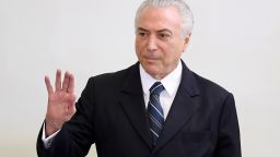 Brazilian president Michel Temer takes part in the "A Year of Achievements" meeting in celebration of the first year of his presidential term, at the Palacio do Planalto in Brasilia, Brazil, on May 12, 2017. 

President Michel Temer celebrated one year at Brazil's helm on Friday with some questioning how much has changed in Latin America's biggest country since the traumatic impeachment of Dilma Rousseff. / AFP PHOTO / EVARISTO SA        (Photo credit should read EVARISTO SA/AFP/Getty Images)
