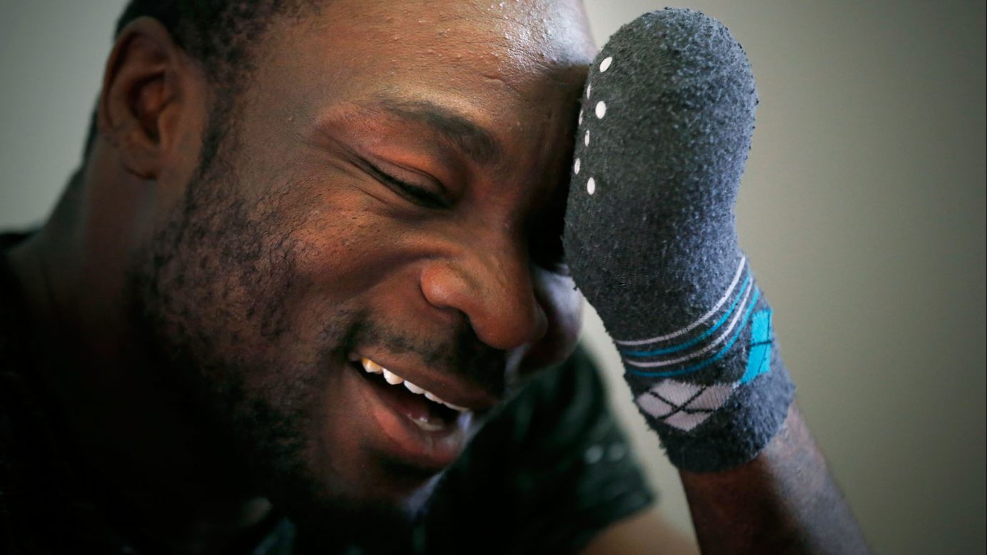 Seidu Mohammed, a refugee from Ghana, smiles after he was granted asylum in Canada on Thursday, May 18. <a href="http://www.cnn.com/2017/02/13/americas/refugees-flee-united-states-for-canada/" target="_blank">He lost all his fingers to frostbite,</a> which he suffered while walking across the border from the United States.