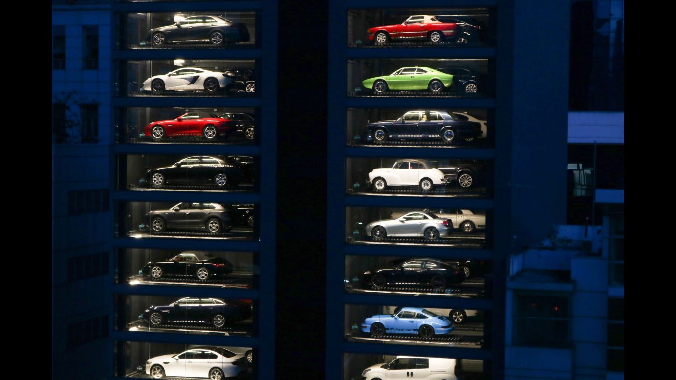 Luxury cars fill <a href="http://money.cnn.com/2017/05/16/news/sports-car-vending-machine-singapore/" target="_blank">a 15-story "vending machine"</a> at a dealership in Singapore on Wednesday, May 17. Autobahn Motors created the tower to save space.