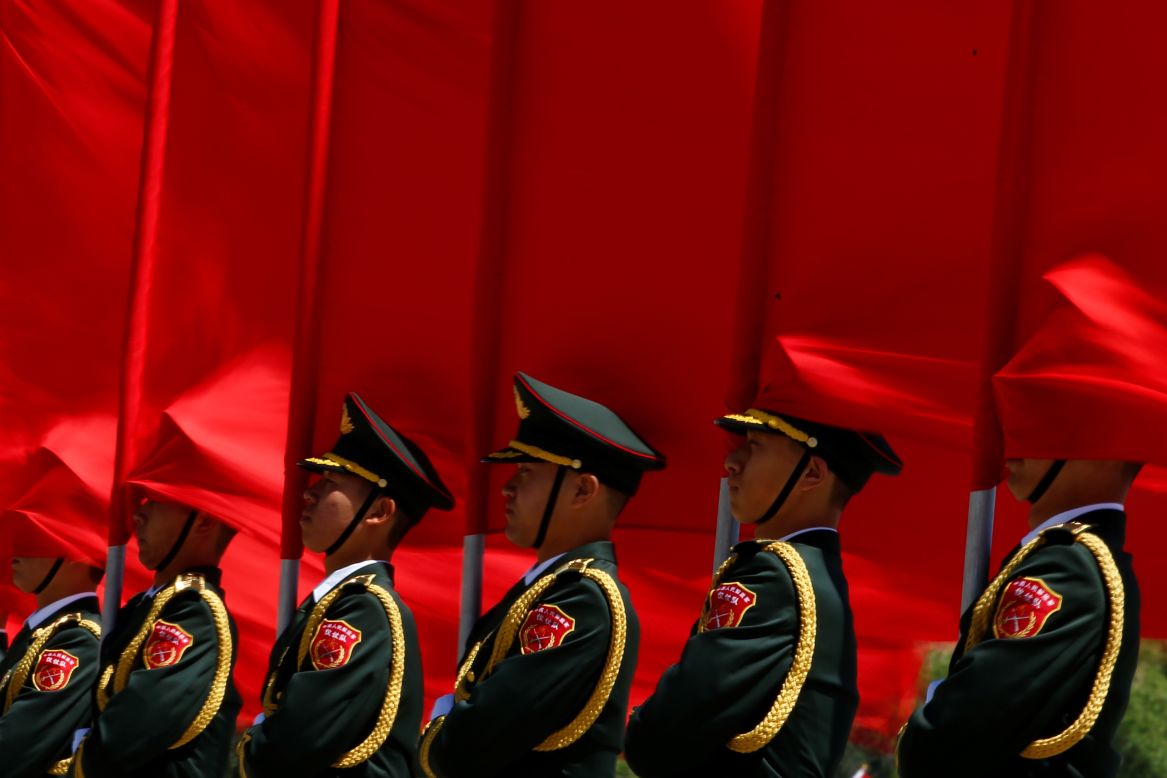 Honor guards stand in Beijing before a welcoming ceremony for Chinese Premier Li Keqiang and Hungarian Prime Minister Viktor Orban on Saturday, May 13. 