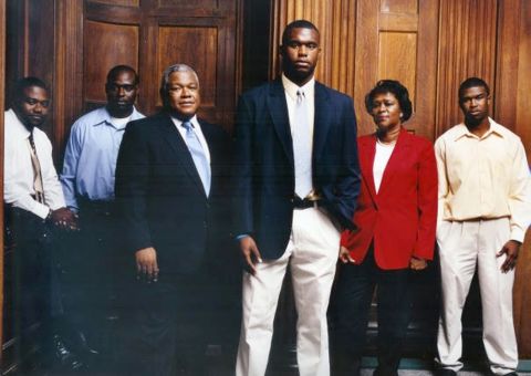 Rolle and his family, from left: Marvis, Mordecai, father Whitney, mother Beverly, and McKinley. The brothers are very close, and Myron's family has supported his endeavors in football and medicine, he says.
