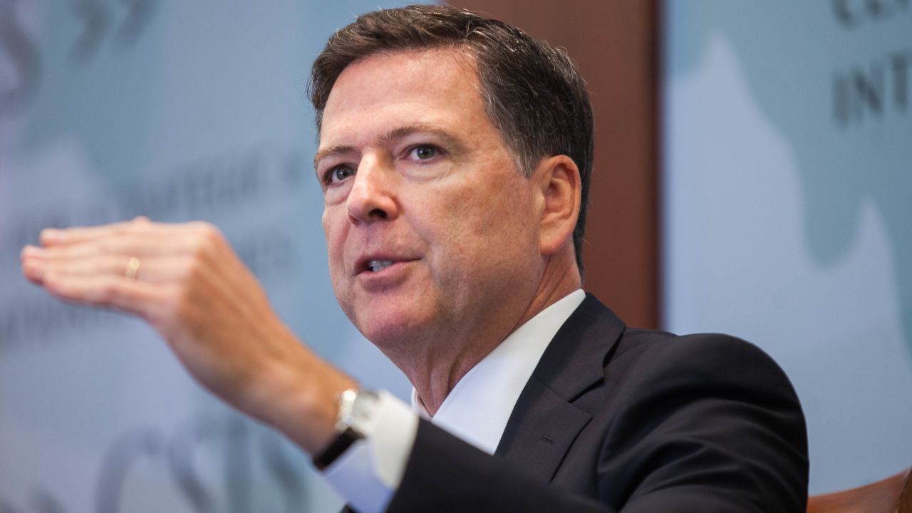 FBI Director James Comey speaks during an interview with National Security Division Assistant Attorney General John Carlin during a conference between The Center for Strategic and International Studies(CSIS) and the Justice Department at the CSIS building September 14, 2016 in Washington, D.C. The National Security Division (NSD) of the US Department of Justice was created after 9/11 to integrate law enforcement, intelligence, and other government tools in the fight against national security threats. September 2016 marks NSD's 10-year anniversary since commencing operations / AFP / ZACH GIBSON (Photo credit should read ZACH GIBSON/AFP/Getty Images)