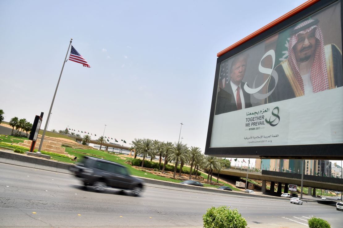 A giant billboard bearing portraits of President Donald Trump and Saudi Arabia's King Salman, is seen on a main road in Riyadh, on May 19, 2017.