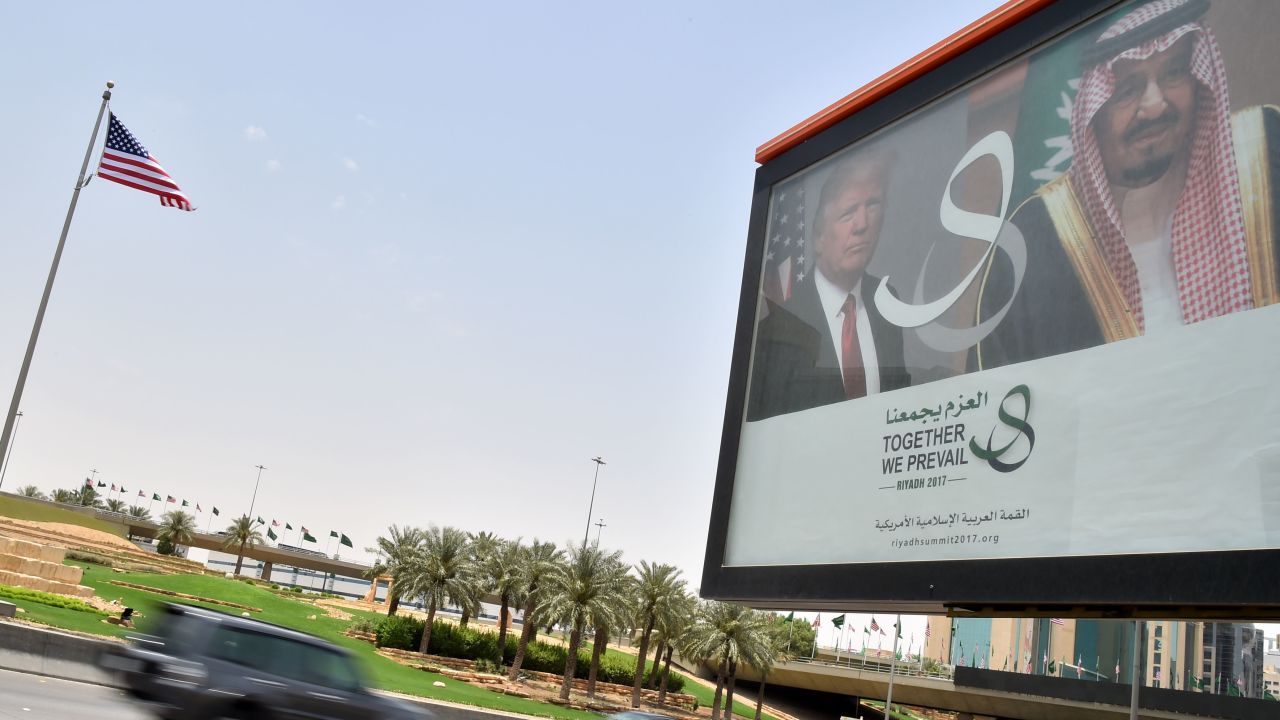 A giant billboard bearing portraits of President Donald Trump and Saudi Arabia's King Salman, is seen on a main road in Riyadh, on May 19, 2017.